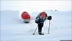 Ann pulls her sledge through the snow