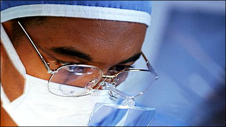 A doctor looking at an xray
