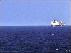 A ship seized by pirates anchored off Haradhere in central Somalia