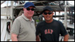Matthew Bannister with Father Joseph Tran