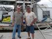 Matthew Bannister with Eric Hansen, owner of the shrimp dock, Port Sulphur.