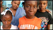 Dieumene Cloristin (in the orange t-shirt)