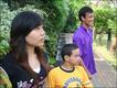 Three former residents of a care home for abandoned disabled children in Thailand