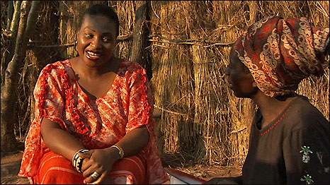 Yvonne Chaka Chaka with Hupa, a community health care worker in Zambia who lost her young son to malaria and now is determined to educate others about the disease. Photo: Princess of Africa Foundation. 