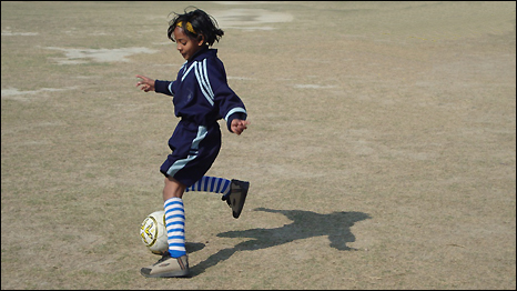 The youngest member of the Akhand Jyoti Eye Hospital girls’ football team trying to re-create a moment from the film Bend It Like Beckham
