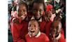 The children at St Giles' School in Harare are often visited by musicians from the Book Cafe, and take great pleasure in their music.