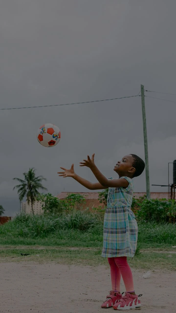 A girl catches a ball
