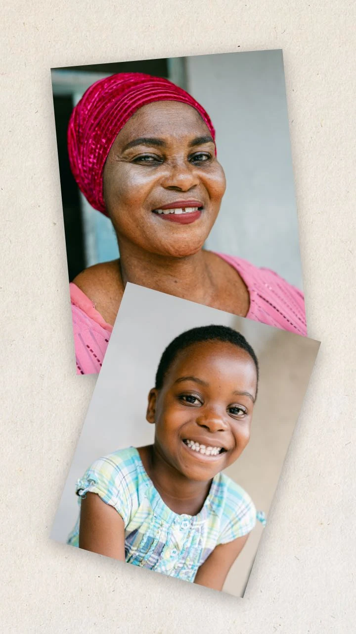 A girl smiles with her grandmother