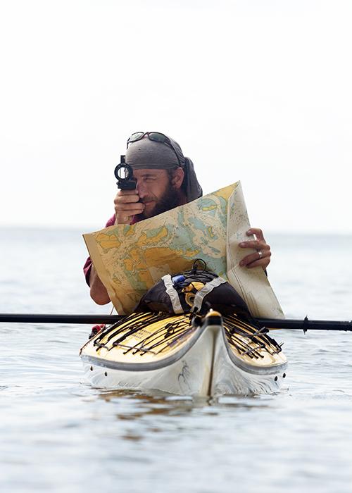 Lewis kayaking in the Riau Archipelago, Indonesia, 2005. Photo © Kenny Brown