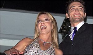 After the crowd chanted her name, Spears re-appeared on a balcony with Mount