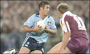 NSW captain Andrew Johns takes on the Queensland defence
