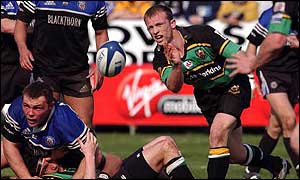 Matt Dawson gets a pass away for Northampton against Bath recently