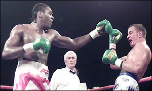 Audley Harrison throws a punch at Mark Krence