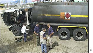 Tanker damaged by blast at fuel depot