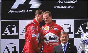 Michael Schumacher invited Rubens Barrichello on to the top step of the podium with him in Austria