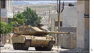 Israeli tank drives through Tulkarm on Saturday