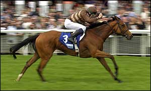 Gossamer surges clear to win the Entenmanns Irish 1,000 Guineas at the Curragh