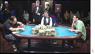 Robert Varkonyi (left), dealer Eric Comer (centre) and Julian Gardner (right)