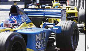 Jarno Trulli holds off Jordan driver Giancarlo Fisichella in the Monaco Grand Prix