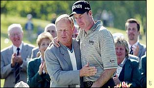 Tournament founder Jack Nicklaus congratulates emotional winner Jim Furyk