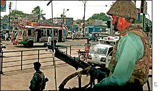 Pakistani paramilitary soldiers on guard in a Karachi street 