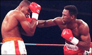 Lennox Lewis throws a right through the guard against Razor Ruddock in 1992
