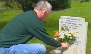Shaun McGuire tends his son's grave in Newport