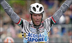 Italy's Marco Cipollini celebrates his victory