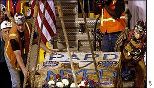 Firemen lift the beam