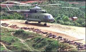 Dead Maoists with a government helicopter