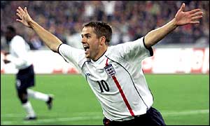 Michael Owen celebrates scoring for England