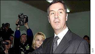 Montenegrin President Milo Djukanovic voting with his wife
