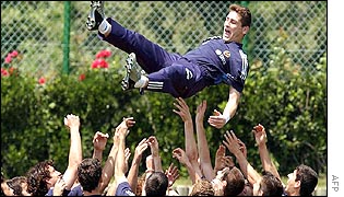 Goalkeeper Iker Casillas is tossed in the air by team-mates in Spain's World Cup football squad