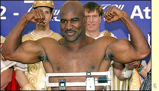 Evander Holyfield at the weigh-in for Saturday's bout - he was 216lbs to Rahman's 224lbs.