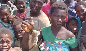 Woman with rat for the pot