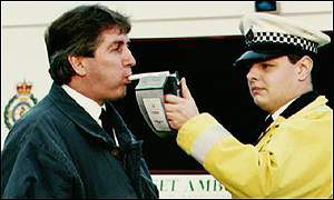A man is breathalysed
