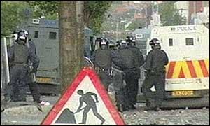 Riot police retreat from riot scene in east Belfast