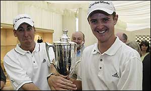 Ian Poulter and Justin Rose pose with the British Masters trophy 