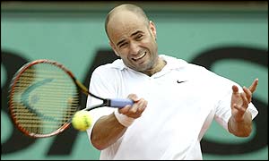 Agassi battles back to take the last three sets and win the match