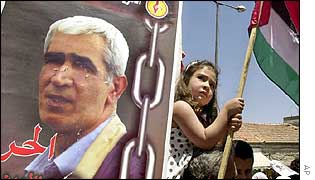 Palestinians rally in support of Ahmed Saadat (on poster)