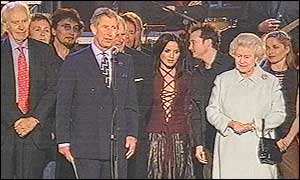 Prince Charles and the Queen on stage