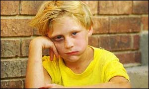 Posed picture of an abused boy 