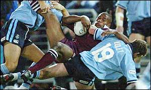 Lote Tuqiri is brought to ground in Origin I