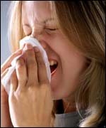 Woman with sniffles