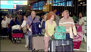 Westerners leaving India through Delhi airport