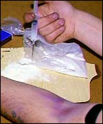 Drug user injecting