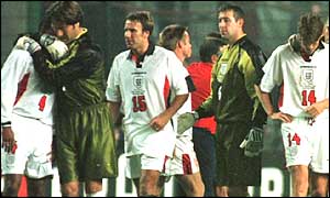 The England team leave the field after being beaten by Argentina in 1998