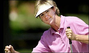 Beth Daniel sinks a birdie on the par three eighth hole