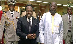 Gabon's President Omar Bongo (centre) flanked by Senegal's Defence Minister Youba Sambo 