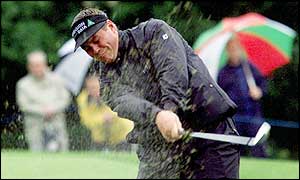 Darren Clarke defied the conditions to move ahead